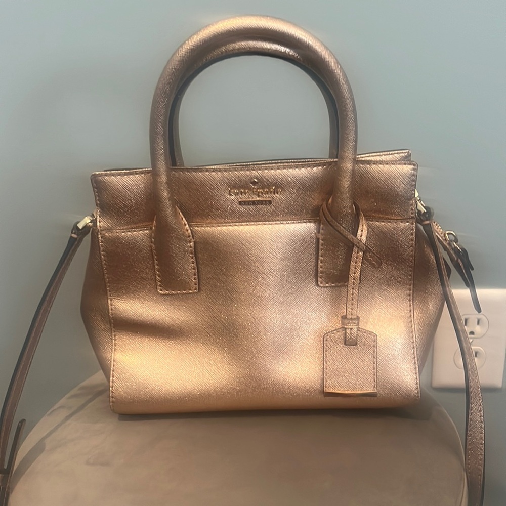 Kate Spade metallic, very light rosey bronze handbag. Perfect condition.